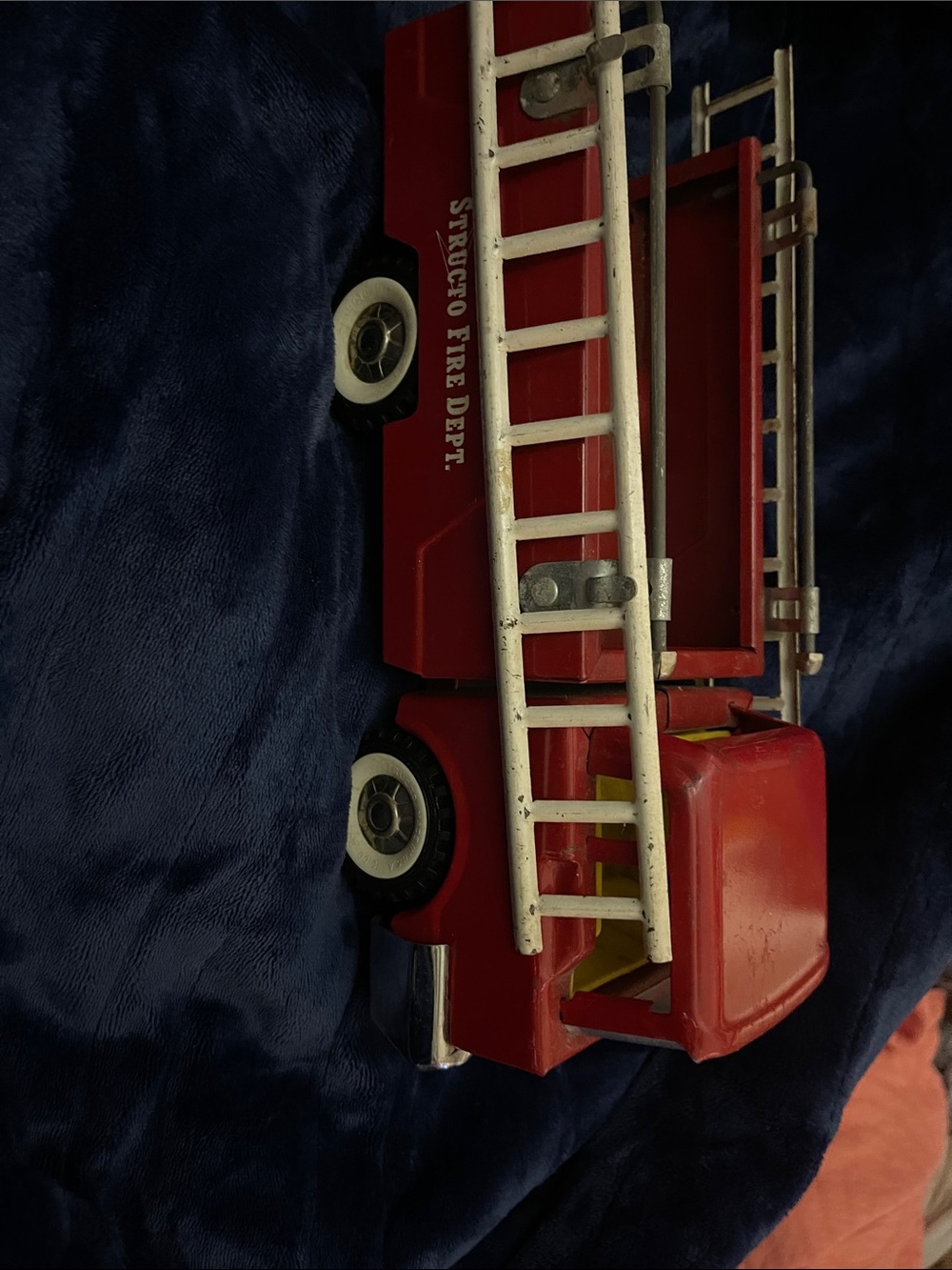 Structo Fire Department metal truck with 2 metal ladders.